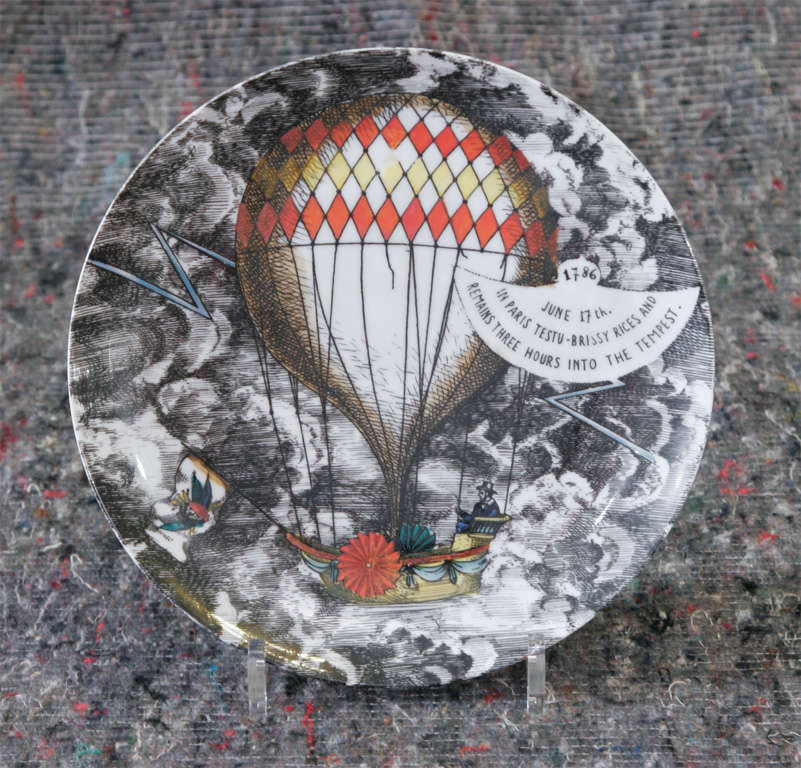A wonderful set of ten porcelain plates by Piero Fornasetti.
"Palloni"
The background lithographically printed and colored with clouds and different historical types of balloons.
Marked to back,
Italy, 1955.